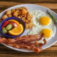 American Classic* (Gf) · Choice of Pederson's all-natural bacon, sausage or ham steak; two eggs. Choice of two sides.