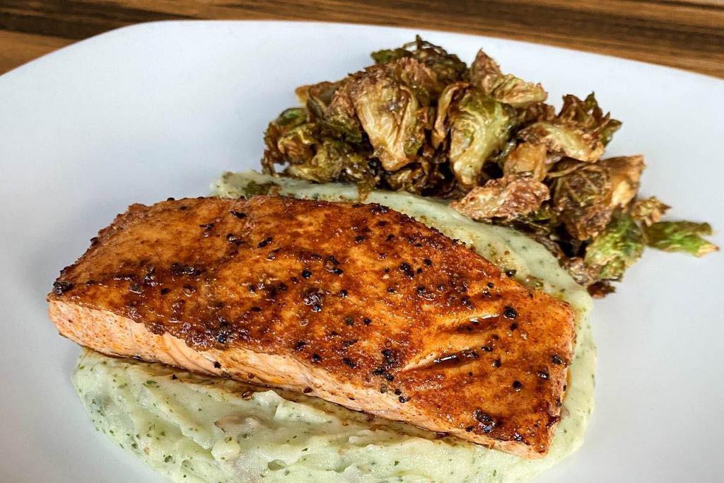 Pan Seared Salmon* (Gf) · Sustainably raised salmon seared with house spice. Served with tamarind glazed Brussels & basil mashed potatoes.