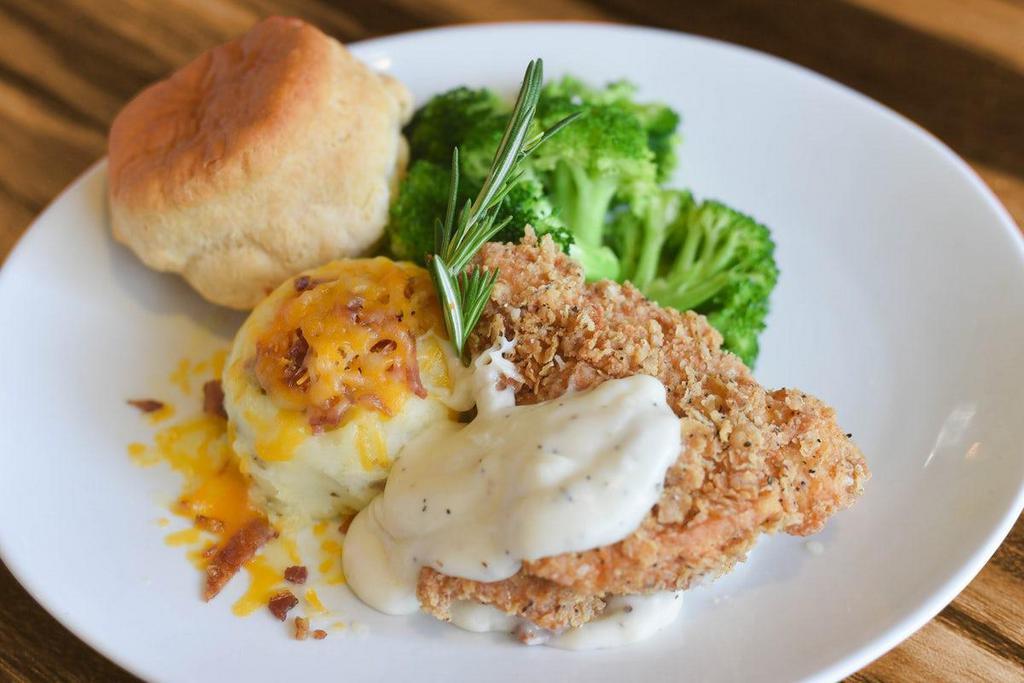 Chicken Fried Chicken · Fried all-natural chicken breast, bacon-cheddar mashed potatoes, broccoli, home-style biscuit, bacon-peppered gravy.