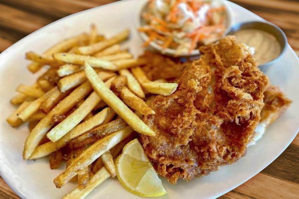 Fish & Chips · Wild caught cod dipped in our homemade chipotle beer batter & fried golden brown. Served with French fries, coleslaw & chipotle aioli.