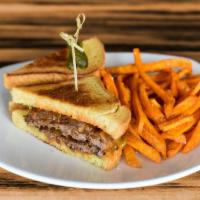 Patty Melt · Two smashed all natural wagyu beef patties covered in caramelized onion, melted cheddar chee...