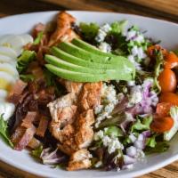 Cobb Salad (Gf) · Spring Mix, grilled all-natural chicken breast, avocado, bacon, blue cheese crumbles, red on...
