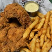 Captain Crunch Tenders · Chicken tenders tossed in captain crunch and corn flakes, fried to a golden brown. Served wi...
