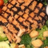 Grilled Chicken Salad · Mixed greens, cherry tomatoes, cucumber,black olives, cheese and croutons. Served with yout ...
