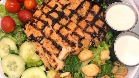 Grilled Chicken Salad · Mixed greens, cherry tomatoes, cucumber,black olives, cheese and croutons. Served with yout favorite dressing.
