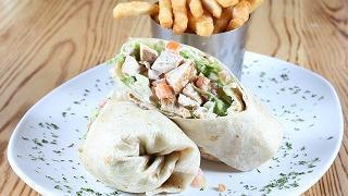 Bettie Boop Wrap · Grilled chicken, shredded lettuce, tomatoes, pepper jack, avocado and ranch in a large flour...