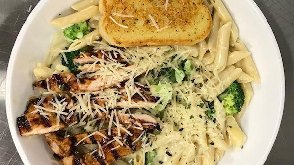 Allied Chicken Penne Pasta · A heaping bowl of penne pasta tossed in our creamy Alfredo sauce with fresh broccoli. Topped with a grilled or blackened chicken breast and Parmesan cheese. Served with a side salad and garlic toast.