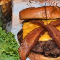 The Tank Burger · A hand crafted burger stuffed with bacon and cheddar cheese then topped off with lettuce, to...