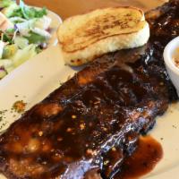 Spirit Of St Louis · St louis style ribs slow cooked and grilled to perfection. Brushed with our signature sweet ...