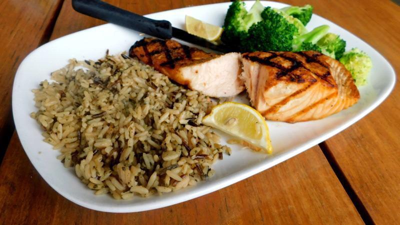 Grilled Salmon · Salmon grilled and seasoned to perfection, served with your choice of side. Try it blackened or with lemon pepper. Add top with our creamy Cajun Alfredo and grilled shrimp for an additional charge.