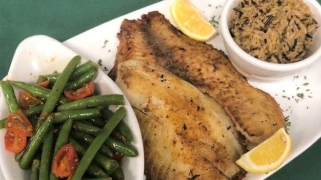 Grilled Tilapia · 2 large filets grilled and seasoned to perfection. Served with your choice of sides. Try it blackened or with lemon pepper. Top with our creamy Cajun Alfredo and grilled shrimp for an additional charge.
