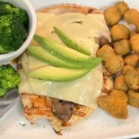 Citadel Grilled Chicken · Grilled chicken topped with sauteed mushrooms, onions, Swiss cheese and fresh avocado. Serve...
