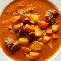 Massaman Curry · massaman curry paste, coconut milk, potato, onion, carrot and peanut.
