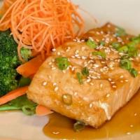 Teriyaki Grilled Salmon  · Grilled Atlantic salmon  served with Homemade Teriyaki sauce, steamed broccoli, carrot, and ...