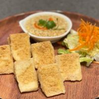 Crispy Tofu (6) · Soft tofu in light tempura.