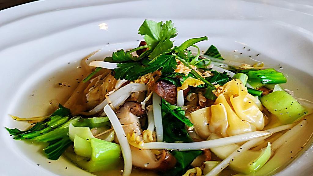 Wonton Soup · A light, flavorful soup made with a clear broth, pork and shrimp dumpling, shiitake mushroom, bean sports, baby bok choy, cilantro, and green onion,