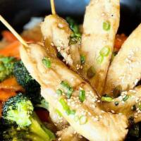 Teriyaki Grilled Chicken · Grilled chicken breast served with homemade teriyaki sauce and steamed broccoli and carrot
