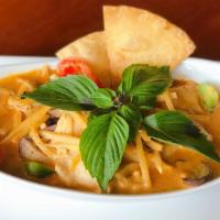 Red Curry · Red curry paste, coconut milk, eggplant, bamboo shoots, bell pepper and fresh basil leaves.