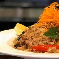 Krapow Fried Rice · Egg, bell peppers, Thai chilies, Thai basil leaves and garlic.