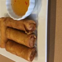 Thai Egg Rolls · Four pieces. Crispy egg roll filled with pork, crystal noodle, carrots, black pepper, and on...