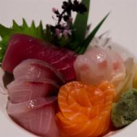 Sashimi Sampler · Assorted sashimi tuna, salmon, white fish.