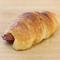 Croissant Sausage Roll With Bacon · Large cheddar sausage roll with bacon wrapped in a flaky croissant dough