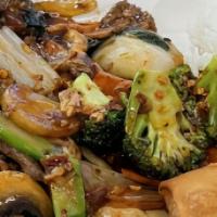 Spicy Hunan · Spicy. Broccoli, snow peas, carrots, celery, water chestnuts, Napa cabbage and mushrooms sti...