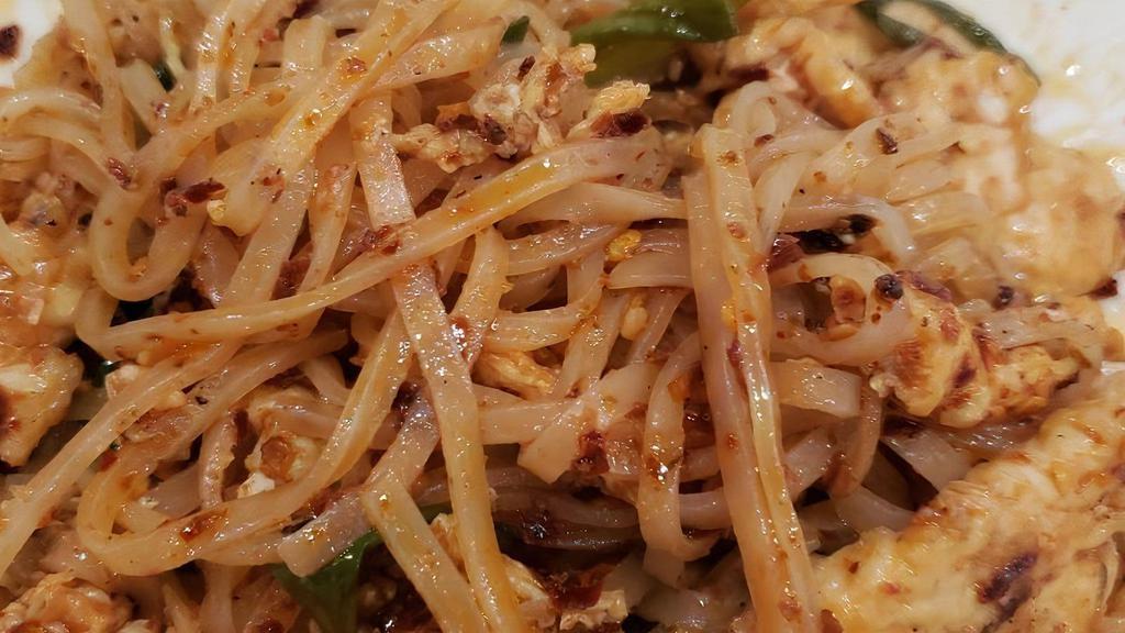 Pad Thai · Rice noodles tossed with bean sprouts, green onions, egg and chopped peanuts.