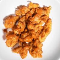 Chicken Poppers · crispy bite-size chicken with garlic aioli dipping sauce