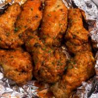 Hot Wings · Eight wings with ranch or blue cheese.