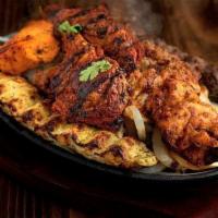 Aga'S Bbq Platter · Chicken and Beef Seekh Kabab, Chicken and Beef Bihari, Chicken Boti and a Grilled Goat Chop.