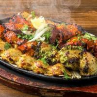 Chicken Bbq Platter · Combination of Chicken Achari Boti, Chicken Boti, Chicken Bihari, and Chicken Kabab.
