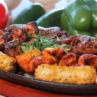 Mixed Bbq Platter · Combination of Chicken and Beef Seekh Kabab, Chicken and Beef Bihari, and Chicken Boti.