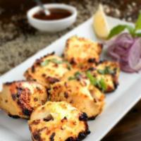 Chicken Malai Boti · Barbecued boneless chicken marinated overnight in a blend of spices and cream.