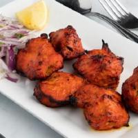 Chicken Boti · Barbecued boneless chicken marinated in exotic spices.