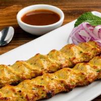 Chicken Reshmi Kabab · Barbecued skewers of chicken marinated in fresh herbs.