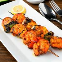 Shrimp Shashlik · Marinated jumbo shrimp barbecued in tandoor and served with fresh seafood sauce.