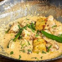 White Chicken Kabab Karahi · Tender chicken pieces cooked on low flame with ginger garlic paste, salt, mild spices, black...