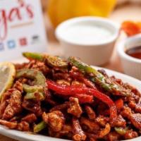 Tawa Chicken · Chopped and cooked on a hot tawa (griddle) and mixed with onions, fresh tomatoes, and specia...