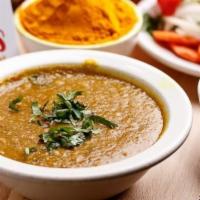 Daal Fry · Mixed lentils cooked in a masala blend of chili, turmeric, and other spices.
