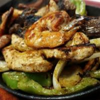 Mixta · Fajita, chicken and shrimp. Grilled Onions and bell peppers.
Served w/ a side of rice and a ...
