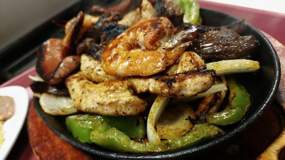 Mixta · Fajita, chicken and shrimp. Grilled Onions and bell peppers.
Served w/ a side of rice and a side or refried beans.
3 Handmade Tortillas