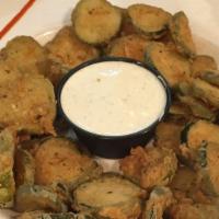 Fried Pickles · Dill pickle chips lightly battered, cajun dusted then deep fried. Served with homemade Ranch...