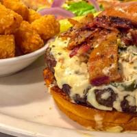 Flame Thrower Burger · Kobe beef burger topped with Pepper Jack cheese, fresh jalapeños, honey pepper bacon bits an...