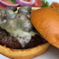 Mushroom & Swiss Burger · Kobe beef burger topped with burgundy mushrooms and smothered with Swiss cheese.
