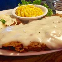 Chicken Fried Steak · Served with white pepper gravy and 2 sides.