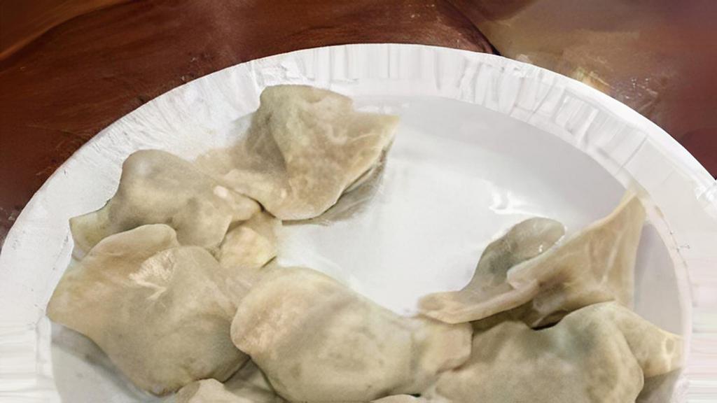 Steamed Dumplings · 6 pieces.