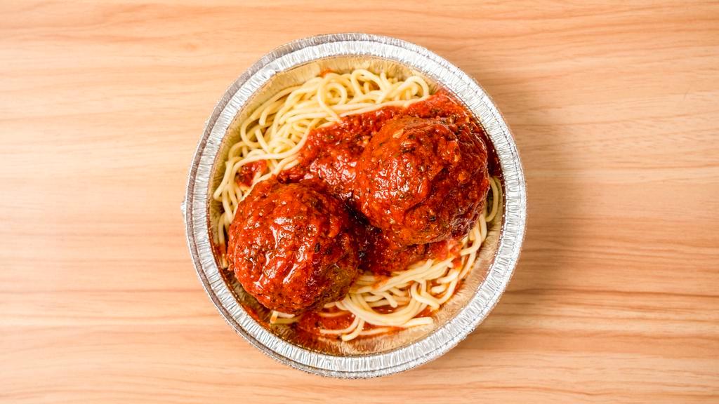 Meatballs · Spaghetti noodles tossed in our marinara sauce topped with 2 roman size meatballs served with a garlic knot and side salad
