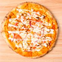 Buffalo Chicken · Creamy house made buffalo sauce, our homemade spiced chicken, onions, tomatoes, special chee...