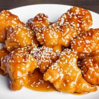 Sesame Chicken · Tender, crispy chicken sauteed in the chef's special sauce with sesame.
